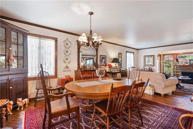 The L shaped living space begins with a spacious d