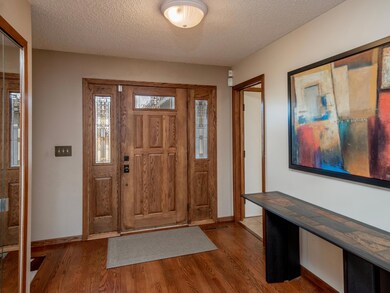 Step inside to a generous sized foyer with a front closet and hardwood flooring.