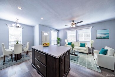 This photo features a virtual staging effect. The property is vacant.