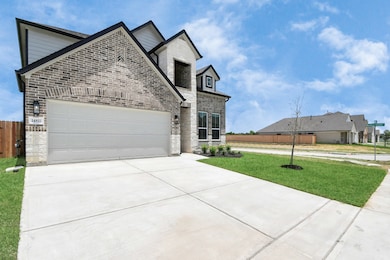The residence features a practical 2-car garage co