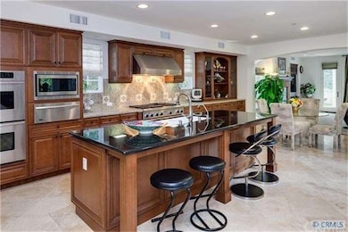 Professional appliances -  granite island and a la
