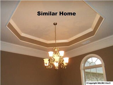 Notice the trim level in the dining room.