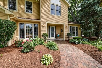 Picturesque Paver Walkway brings you to the entran