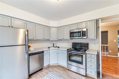 Additional view of kitchen, showing double doors l
