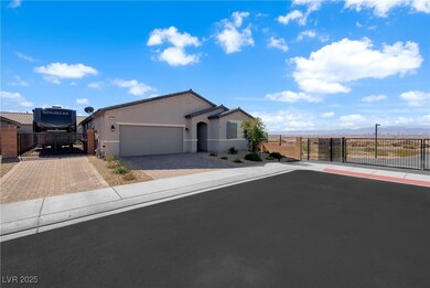 Ranch-style home with driveway, an attached garage