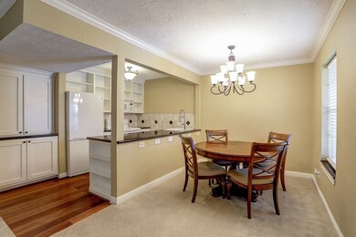 The kitchen was opened up to the dining room to ma