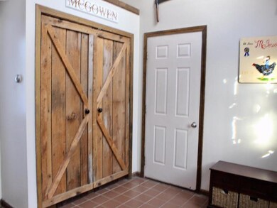Mudroom storage and beautiful barn doors