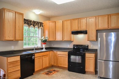 Kitchen comes fully applianced.