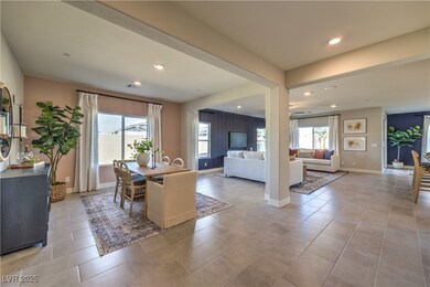 Dining space with plenty of natural light, recessed lighting, and light tile patterned floors