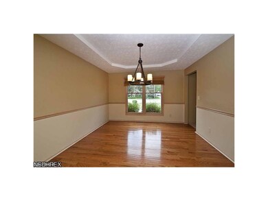Formal dining room with tray ceiling, chair mouldi