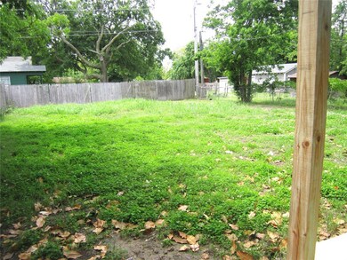 View of fenced backyard