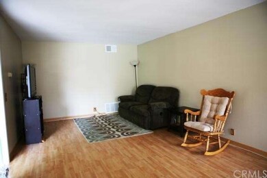 Spacious Living Room with Newer Laminate Floors, B