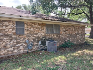 View of property exterior with central air conditi