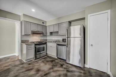Kitchen featuring appliances with stainless steel