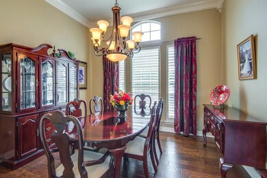Spacious dining room with new wood floors and upda