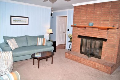 Den with gas fireplace