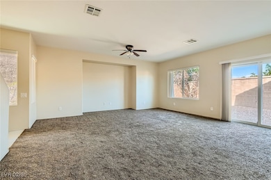 Carpeted empty room featuring healthy amount of na