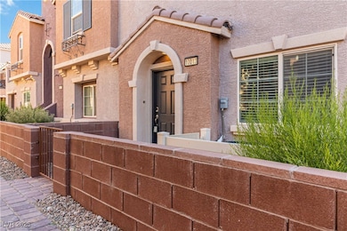 Doorway to property with stucco siding and a tile