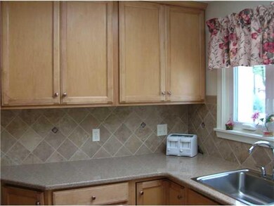Kitchen Kitchen enhanced by tile backsplash