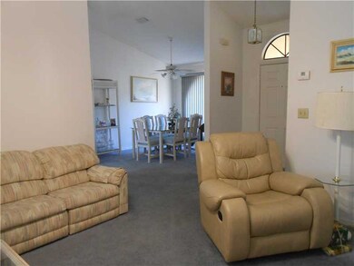 Living Room. this open space leads to the formal d