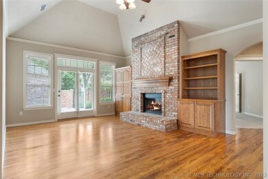 Beautiful brick fireplace with doors to patio