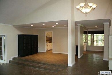 Entry & living Room with Formal Dining Room off Ki