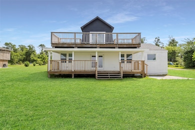 Back of Home with Two Stretching Water View Decks