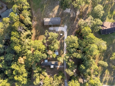 An aerial view of the two homes from above