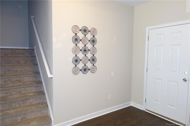 Entry ~ Wide Hallway & Recessed Stairs