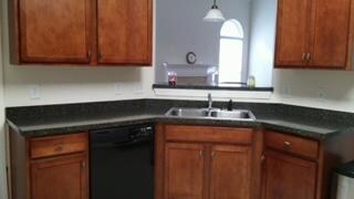 Kitchem with granite counter tops and beautiful cabinets