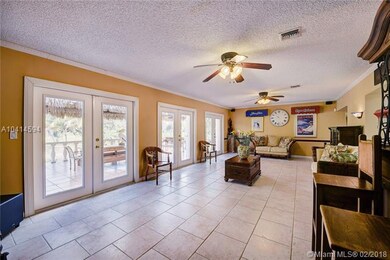 Triple full panel view french doors provide for gr