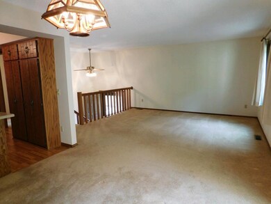 Spacious light-filled living room.