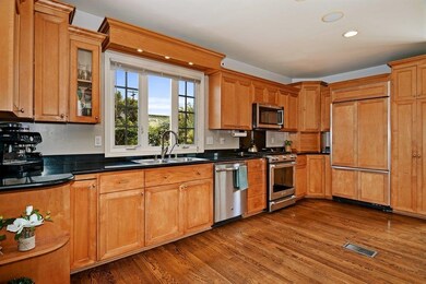 The updated Kitchen features TONS of counter/prep 