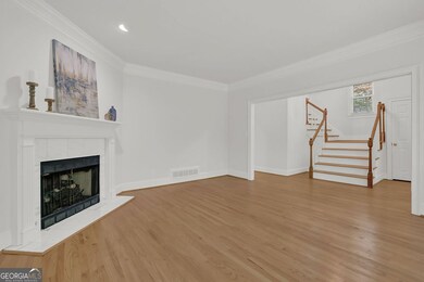 Living room / family room with gas fireplace.
