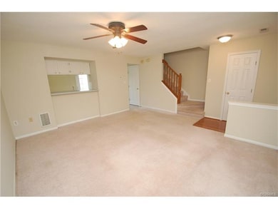 Family room is open to staircase and half bath nea