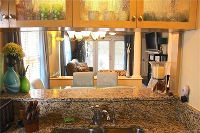 Granite countertops with  bar top in kitchen