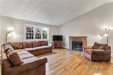 Expansive great room with wood burning fireplace a