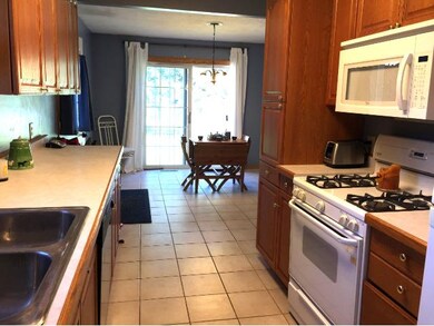 Tiled kitchen and dining area floor