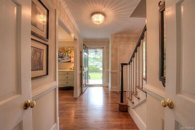 View from Kitchen through Foyer.  Note the wood fl