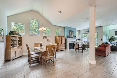 Bright open floor plan with beautiful wood-look ti