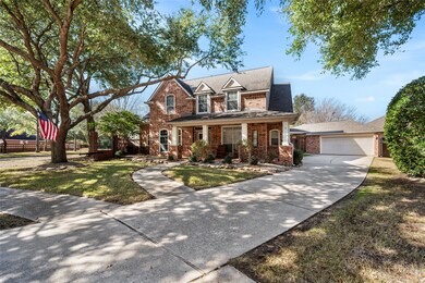 The long driveway leading up to the oversized two car garage provides plenty of parking.