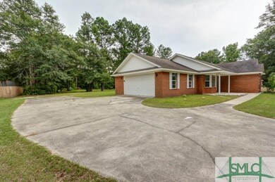 long driveway with tons of paking