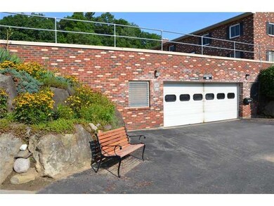 Exterior Front. Entry to underground garage.