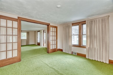 #900-PARLOR/FAMILY ROOM**Hardwoods under carpeting