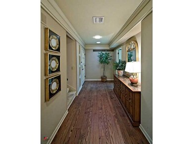 Entry/Foyer. Entry has crown molding and wood floo