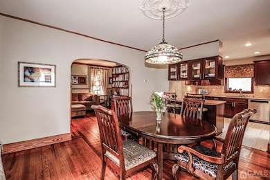 Enter the Formal Dining room through arch way from