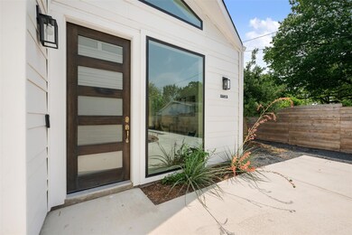 Doorway to property featuring a patio
