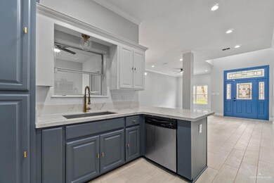 Kitchen featuring a ceiling fan, dishwasher, recessed lighting, a peninsula, and light stone counters