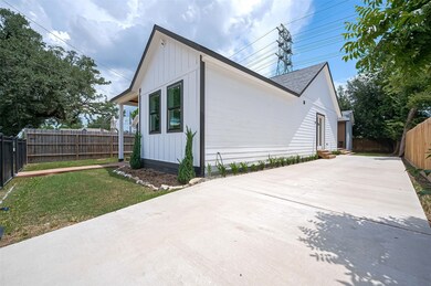 Charming modern home featuring a crisp white exter