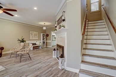 The entry way greets you into the living area drenched in natural light.